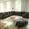 Wohnlandschaft Clovis XXL Schwarz Hocker Ottomane Links modular