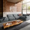 Ecksofa Basit 380x225 cm Strukturstoff Grau Ottomane rechts mit Hocker
