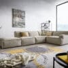 Ecksofa Basit 380x225 cm Chenille Beige Ottomane rechts mit Hocker